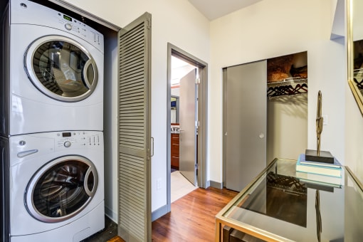 Hallway with Washer and Dryer  at Equinox Apartments, Seattle